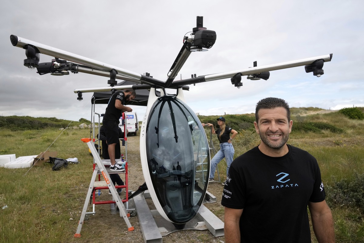 Franky Zapata poses next his machine before a failed attempt to cross the Channel Friday, July 25, 2025 in Sangatte, northern France. (AP Photo/Michel Euler)
Franky Zapata