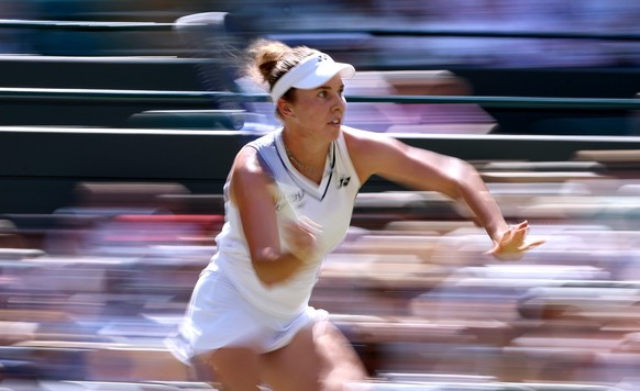 epa13098205 Linda Noskova of Czechia in action during her Women's Singles quarter-final match against Elise Mertens of Belgium at the Wimbledon Championships in London, Britain, 08 July 2026. EPA ...