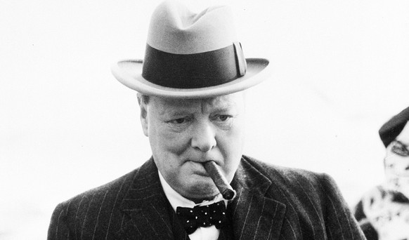 FILE - This Aug. 23, 1939 file photo shows Winston Churchill. A cigar once half-smoked by British Prime Minister Winston Churchill during a 1947 trip to Paris has sold for just over $12,000 during an  ...