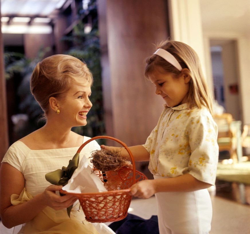 American actress Debbie Reynolds (Mary Frances Reynolds) posing with her daughter Carrie Fisher. USA, 1964 (Photo by Pierluigi Praturlon/Reporters Associati &amp; Archivi/Mondadori Portfolio via Getty ...