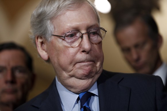 epa07926058 Senate Majority Leader Mitch McConnell responds to a question from the news media during a press conference following the Republican policy luncheon in the US Capitol in Washington, DC, US ...