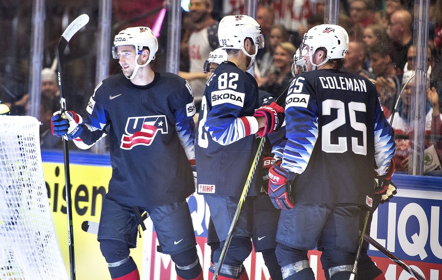 epa06711206 USA&#039;s players celebrate during the IIHF World Championship Group B match between USA and Canada in Jyske Bank Boxen in Herning, Denmark, 04 May 2018. EPA/Henning Bagger DENMARK OUT