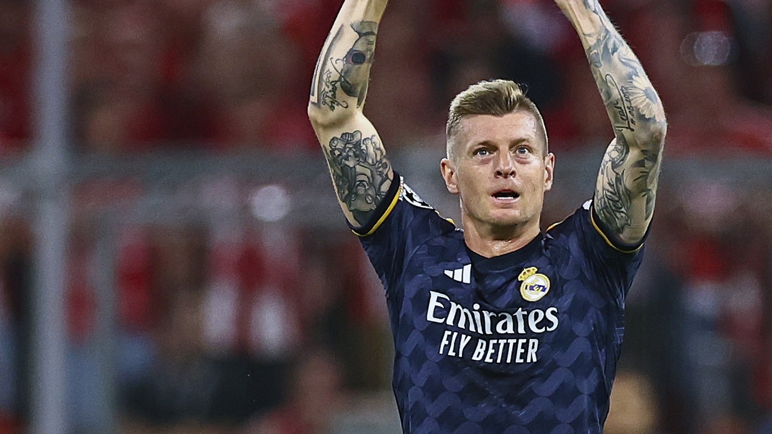 epa11310950 Real Madrid&#039;s Toni Kroos celebrates after the team scored the 1-0 lead during the UEFA Champions League semi final, 1st leg match between Bayern Munich and Real Madrid in Munich, Germ ...