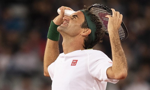 epa08201043 Roger Federer of Switzerland reacts whilst playing Rafael Nadal from Spain (not pictured) during the Match in Africa Cape Town charity event, Cape Town, South Africa 07 February 2020. Pres ...