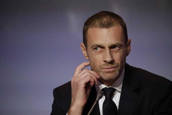 FILE - In this Thursday, Feb. 7, 2019 file photo, UEFA President Aleksander Ceferin listens to reporter&#039;s questions during a press conference at the end of the 43rd UEFA congress in Rome. Ceferin ...