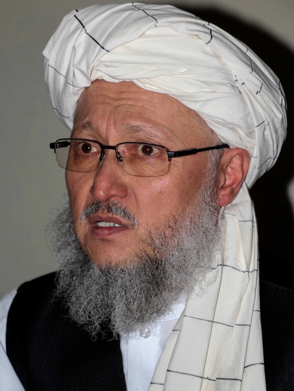 epa09454064 (FILE) - Mullah Abdul Salam Hanafi, member of Taliban&#039;s Qatar political office, speaks to journalists in Kandahar, Afghanistan, 17 August 2021 (issued 07 September 2021).(reissued 07  ...