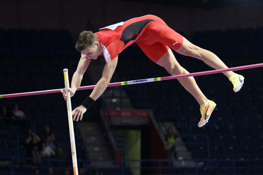 Simon Ehammer of Switzerland, competes during the Men&#039;s Pole Vault of the Heptathlon, at the World Athletics Indoor Championships, at the Stark Arena in Belgrade, Serbia, Saturday, March 19, 2022 ...