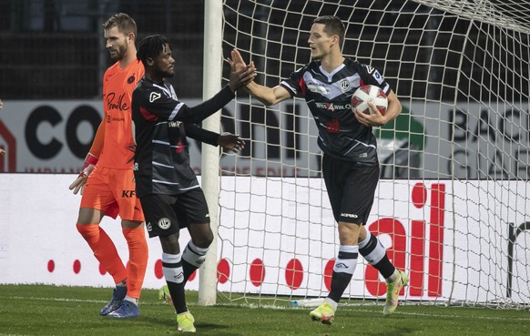 Lugano&#039;s player Celar Zan, right, celebrates the 1-1 goal, during the Super League soccer match between FC Lugano and FC Servette at the Cornaredo stadium in Lugano, on Sunday, 31 October 2021. ( ...