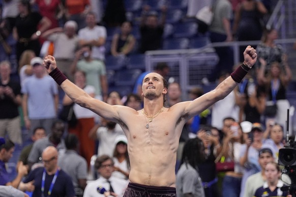 Alexander Zverev, of Germany, celebrates after defeating Quentin Halys, of France, in five sets in the the second round of the U.S. Open tennis championships, early Friday, Sept. 4, 2026, in New York. ...