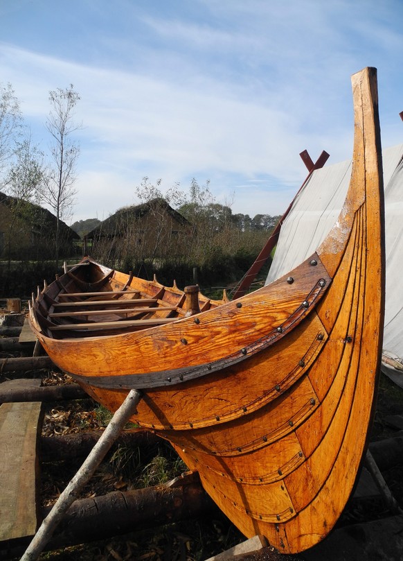epa04470261 A newly built wooden ship is on display on the grounds of the Viking Center Haithabu near Schleswig, Germany, 30 October 2014. Almost 1,000 years after the last relay race at Haithabu, a n ...