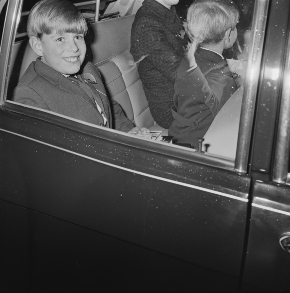 Prince Andrew and Prince Edward with their governess, Lavinia Keppel, at the Children's Book Show in Westminster, London, 7th November 1969. (Photo by Terry Disney/Daily Express/Hulton Archive/Ge ...