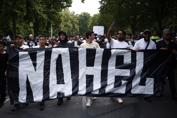 epa10717295 People attend a march in memory of 17-year-old Nahel who was killed by French Police in Nanterre, near Paris, France, 29 June 2023. Violence broke out after the police fatally shot a 17-ye ...
