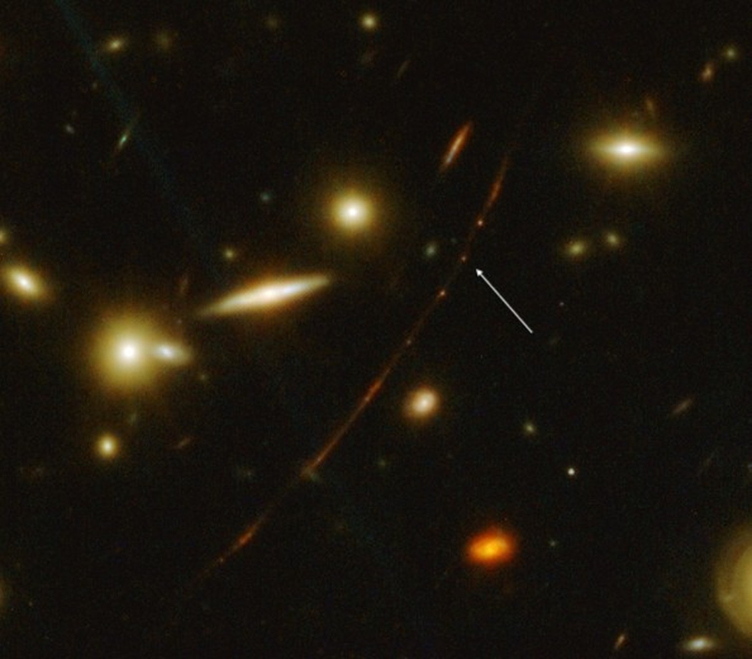 An image taken by the James Webb telescope of the most distant star in the Earendel Universe.