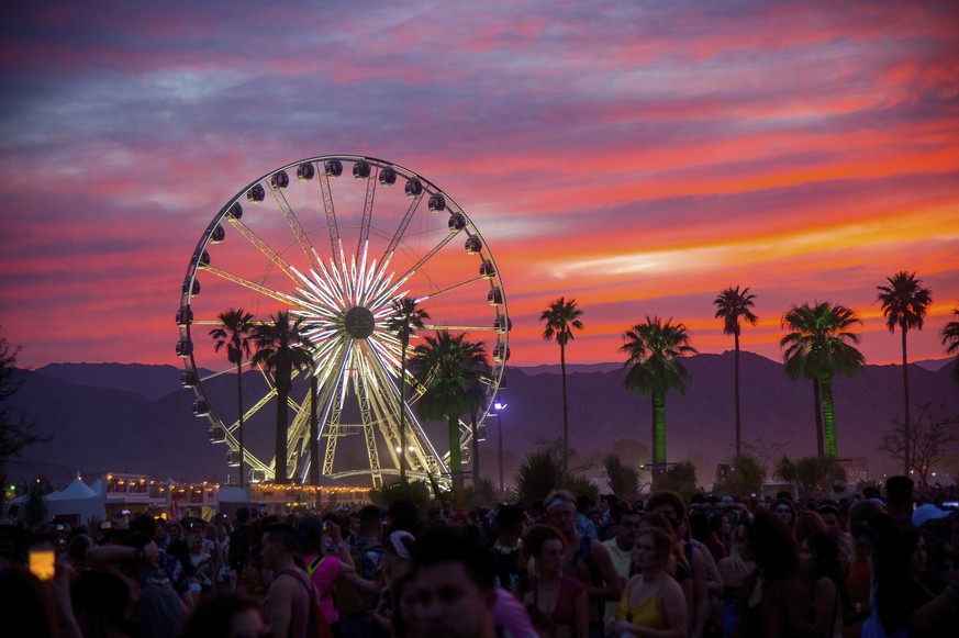 The sun sets over the Coachella Music &amp; Arts Festival at the Empire Polo Club on Saturday, April 21, 2018, in Indio, Calif. (Photo by Amy Harris/Invision/AP)