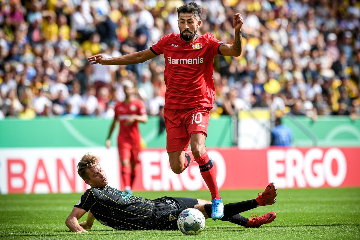 epa07766217 Aachen's Peter Hackenberg (buttom-L) in action against Leverkusen's Kerem Demirbay (top-R) during the German DFB Cup 1st round soccer match between Alemannia Aachen and Bayer Lev ...