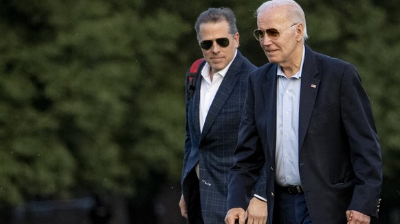 President Joe Biden, and his son Hunter Biden arrive at Fort McNair, Sunday, June 25, 2023, in Washington. The Biden&#039;s are returning from Camp David. (AP Photo/Andrew Harnik)
Joe Biden,Hunter Bid ...