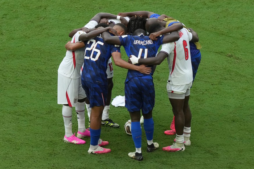 France and England players huddle after the World Cup third-place playoff soccer match between France and England in Miami Gardens, Fla., Saturday, July 18, 2026. (AP Photo/Marta Lavandier)
England Fr ...