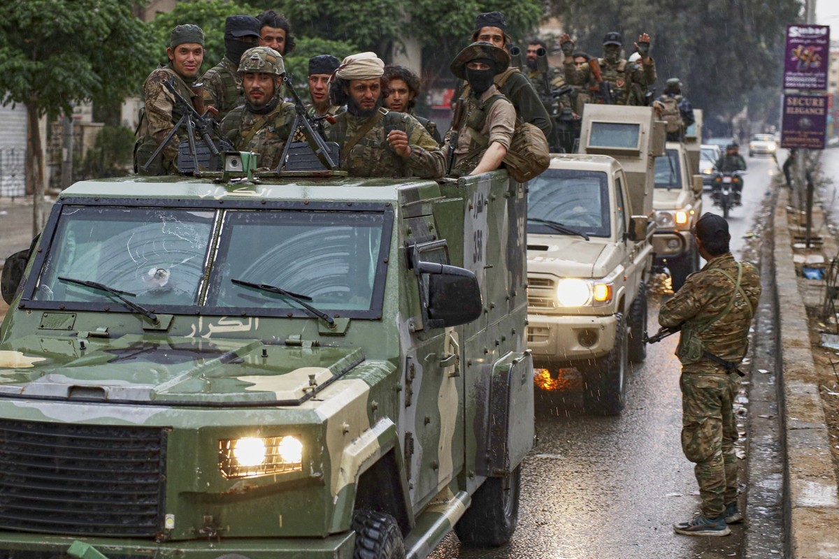 Members of Syria's security forces deploy in the town of Sahnaya, south of Damascus, on Wednesday, April 30, 2025, after earlier clashes with Druze fighters left at least 11 people dead.
