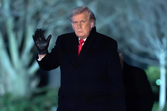 President Donald Trump waves to the media as he walks on the South Lawn of the White House, Tuesday, Jan. 20, 2026, in Washington. (AP Photo/Jose Luis Magana)
Donald Trump