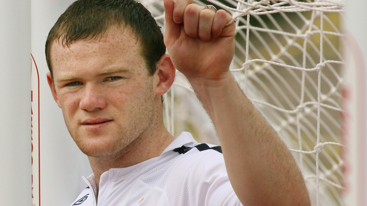 England national soccer team striker Wayne Rooney poses for photographs after a training session at Mittelbergstadion in Buehlertal, Germany, Wednesday June 28, 2006. England face Portugal in a World ...