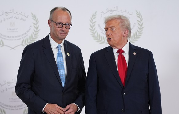 President Donald Trump greets Germany&#039;s Chancellor Friedrich Merz during summit to support ending the more than two-year Israel-Hamas war in Gaza after a breakthrough ceasefire deal, Monday, Oct. ...