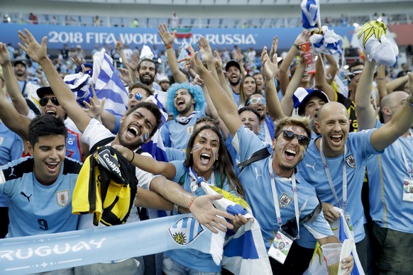 Uruguay&#039;s fans cheer prior the round of 16 match between Uruguay and Portugal at the 2018 soccer World Cup at the Fisht Stadium in Sochi, Russia, Saturday, June 30, 2018. (AP Photo/Andre Penner)