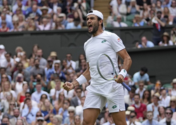 Italy&#039;s Matteo Berrettini celebrates after defeating Poland&#039;s Hubert Hurkacz during the men&#039;s singles semifinals match on day eleven of the Wimbledon Tennis Championships in London, Fri ...