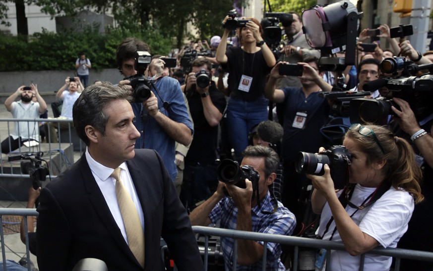 epa06963242 Michael Cohen (L), President Donald Trump&#039;s personal attorney leaves following a hearing at United States Federal Court in New York, New York, USA, 21 August 2018. Former attorney for ...