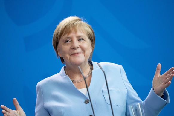 epa08332721 (FILE) - German Chancellor Angela Merkel gestures as she attends a joint press conference at the Chancellery in Berlin, Germany, 14 August 2019 (reissued March 2020). Media reports state o ...