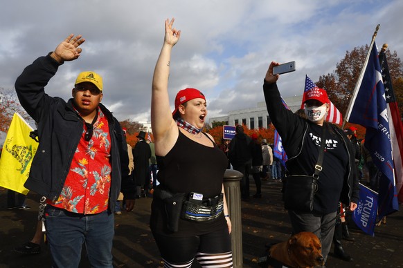 Supporters of President Donald Trump attend a rally to protest against President-elect Joe Biden&#039;s win Saturday, Nov. 7, 2020 in Salem, Ore. Democrat Joe Biden defeated President Donald Trump to  ...