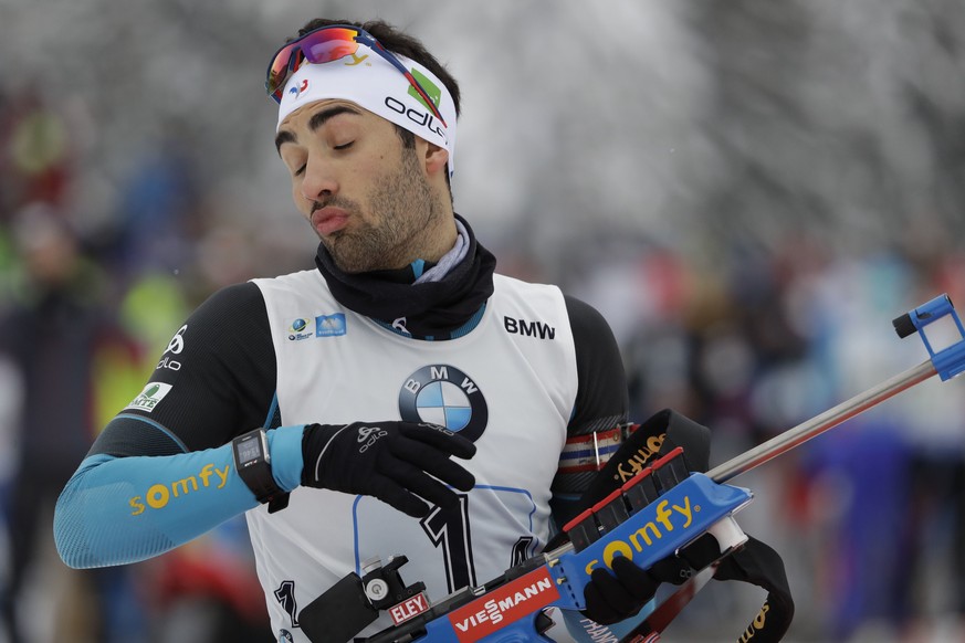 CORRECTS FIRST NAME TO MARTIN - France&#039;s Martin Fourcade closes his eyes as he warms up prior to the men&#039;s 4x7.5 km relay competition at the Biathlon World Cup in Ruhpolding, Germany, Wednes ...