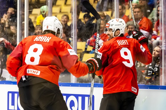 Switzerland&#039;s forward Damien Riat, right, celebrates his goal with his teammate Switzerland&#039;s forward Simon Knak, left after scoring the 1:0, during the IIHF 2025 World Championship prelimin ...