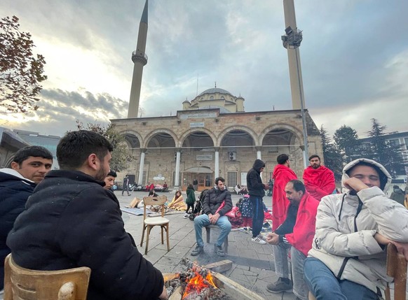 epa10321741 People stay at the streets after a magnitude 5.9 earthquake in Duzce, Turkey, 23 November 2022. Although the earthquake hits in Duzce, it was felt in many cities such as Istanbul and Ankar ...