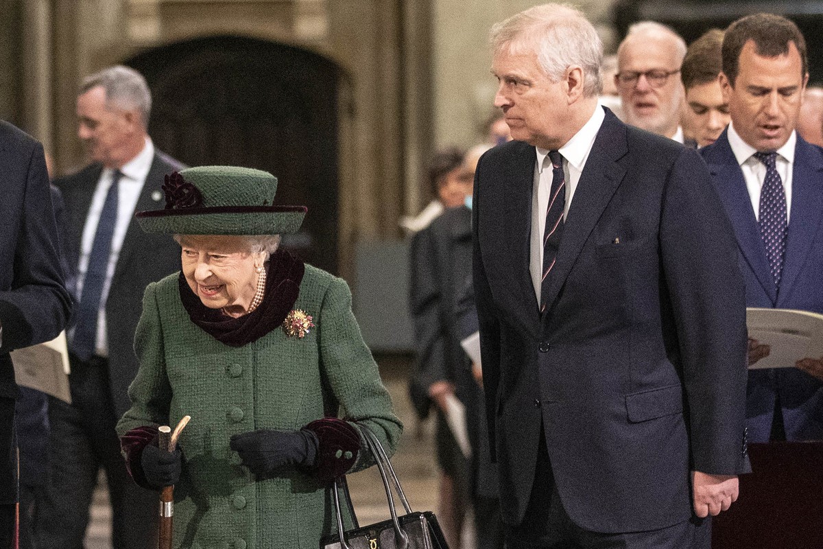 Britain's Queen Elizabeth II and Prince Andrew, center right, arrive for a Service of Thanksgiving for the life of Prince Philip, Duke of Edinburgh, at Westminster Abbey in London, Tuesday, March ...