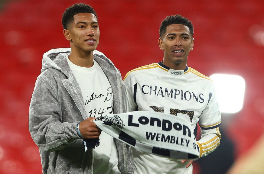 Jude Bellingham of Real Madrid celebrates with brother Jobe at full time Borussia Dortmund v Real Madrid, UEFA Champions League, Final, Football, Wembley Stadium, London, UK - 01 June 2024 EDITORIAL U ...