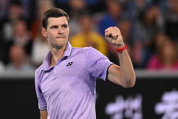 epa10417547 Hubert Hurkacz of Poland celebrates a point during his match against Denis Shapovalov of Canada at the 2023 Australian Open tennis tournament in Melbourne, Australia, 20 January 2023. EPA/ ...