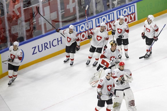 Switzerland&#039;s players leave the rink after losing against Russia, during the IIHF 2018 World Championship preliminary round game between Russia and Switzerland, at the Royal Arena, in Copenhagen, ...