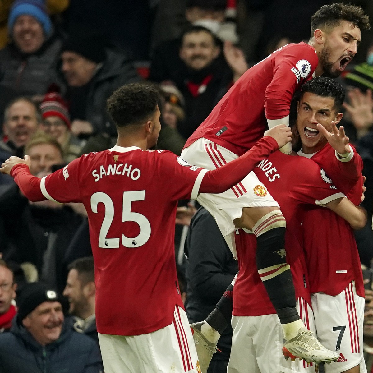 Manchester United's Cristiano Ronaldo, right, celebrates after scoring his side's second goal during the English Premier League soccer match between Manchester United and Arsenal at Old Traf ...