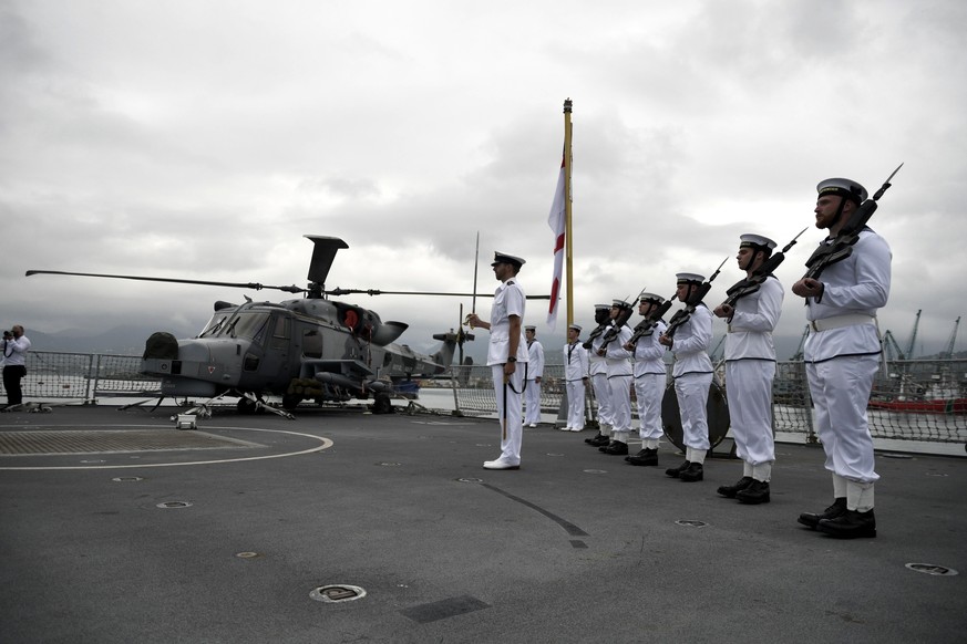 epa09303498 A handout photo made available by the British Embassy in Georgia shows British Royal Navy crew aboard the British destroyer HMS Defender at the Batumi sea port in Georgia, 26 June 2021. Th ...