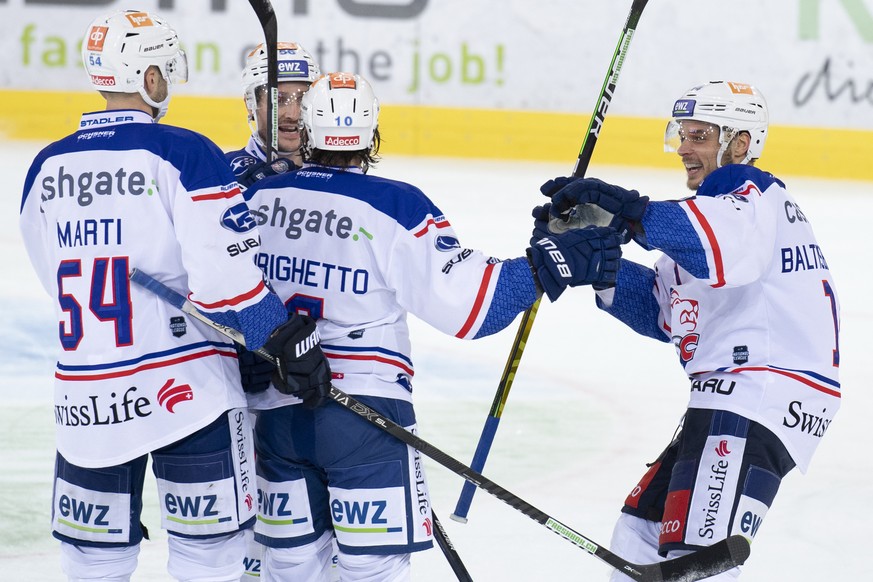 Lions Christian Marti, Maxim Noreau, Sven Andrighetto, Chris Baltisberger, von links, jubeln waehrend dem Meisterschaftsspiel der National League zwischen den SCL Tigers und den ZSC Lions, am Dienstag ...