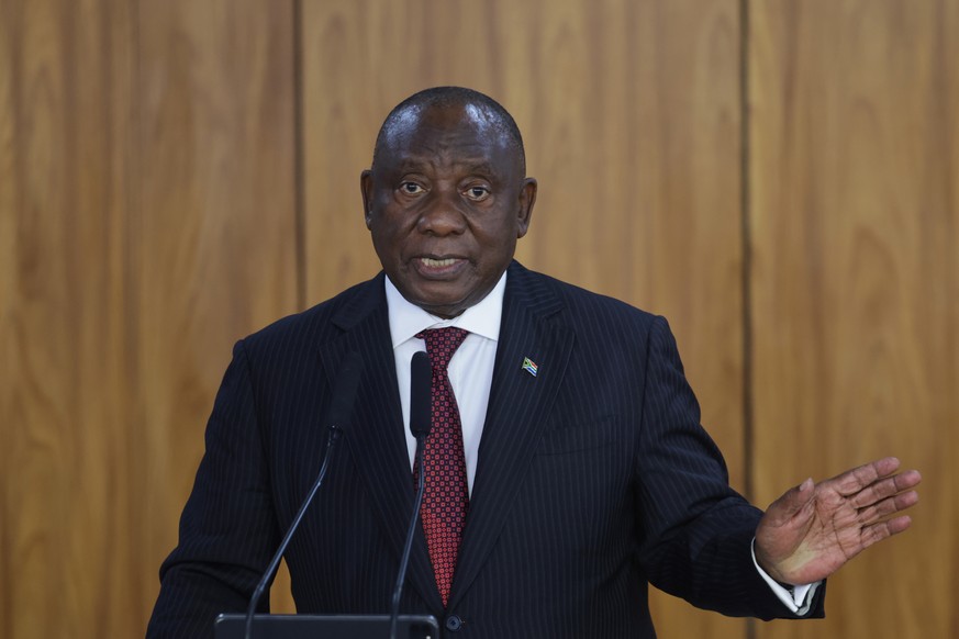 FILE - South Africa's President Cyril Ramaphosa speaks with journalists after meeting with Brazilian President Luiz Inacio Lula da Silva at Planalto Palace in Brasilia, Brazil, on, March 9, 2026. ...