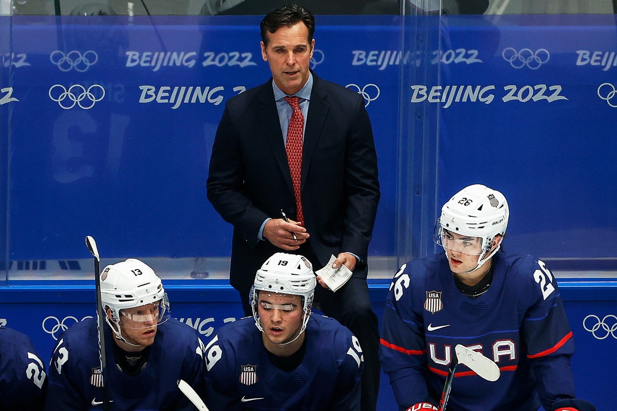 epa09744294 US head coach David Quinn reacts during the Men's Ice Hockey preliminary round match between the USA and China at the Beijing 2022 Olympic Games in Beijing, China, 10 February 2022. E ...