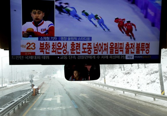 A bus driver travels to the Phoenix Snow Park in an Olympic lane at the 2018 Winter Olympics in Pyeongchang, South Korea, Saturday, Feb. 3, 2018. The venue will host freestyle skiing and snowboarding  ...