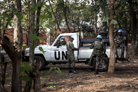 epa08905667 United Nations Multidimensional Integrated Stabilization Mission in the Central African Republic (MINUSCA) forces guard a polling station in Bangui, Central African Republic, 27 December 2 ...