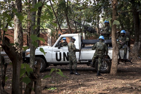 epa08905667 United Nations Multidimensional Integrated Stabilization Mission in the Central African Republic (MINUSCA) forces guard a polling station in Bangui, Central African Republic, 27 December 2 ...
