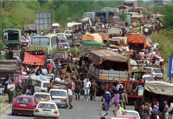 A column of Serb refugees from Croatia blocked main Banja Luka to Belgrade road in northwestern Bosnian Serb stronghold near Banja Luka, some 100 miles (160 kms) northwest of Sarajevo Tuesday August 8 ...