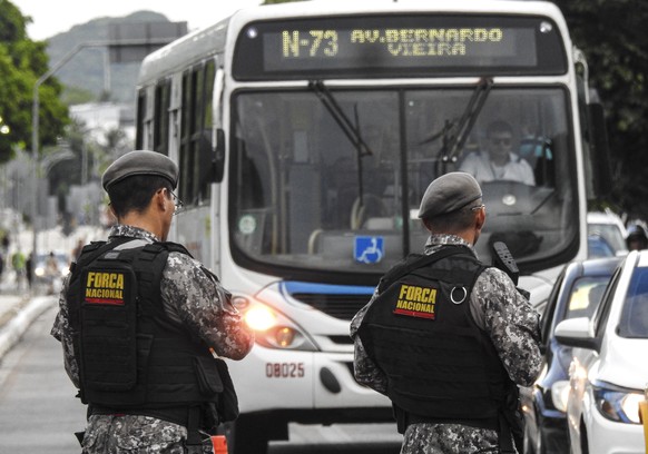 epa10525103 Agents of the National Force carry out patrols in the city of Natal, capital of the state of Rio Grande do Norte, Brazil, 15 March 2023. The Brazilian government has sent a contingent of 2 ...