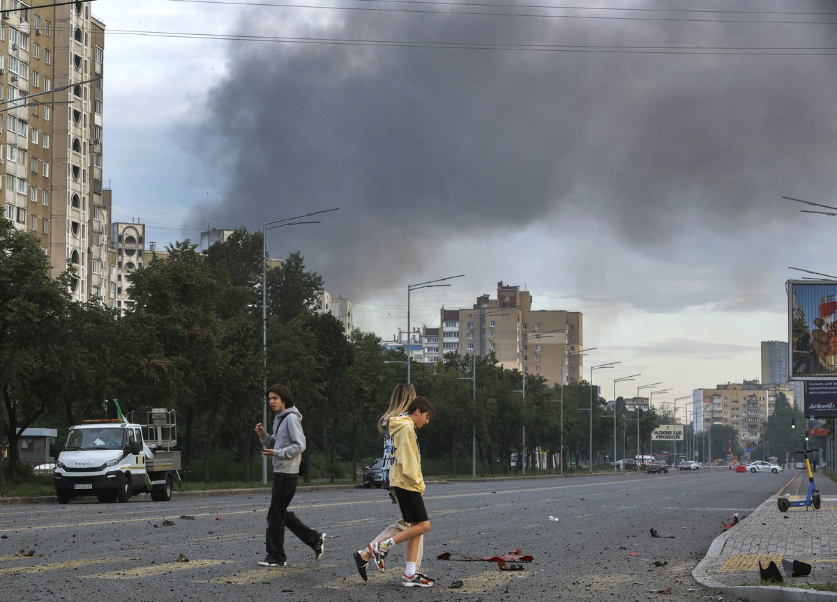 epa13103984 Smoke rises above the city after a Russian missile attack in Kyiv, Ukraine, 11 July 2026, amid the Russian invasion. According to the State Emergency Service, at least 10 people, including ...