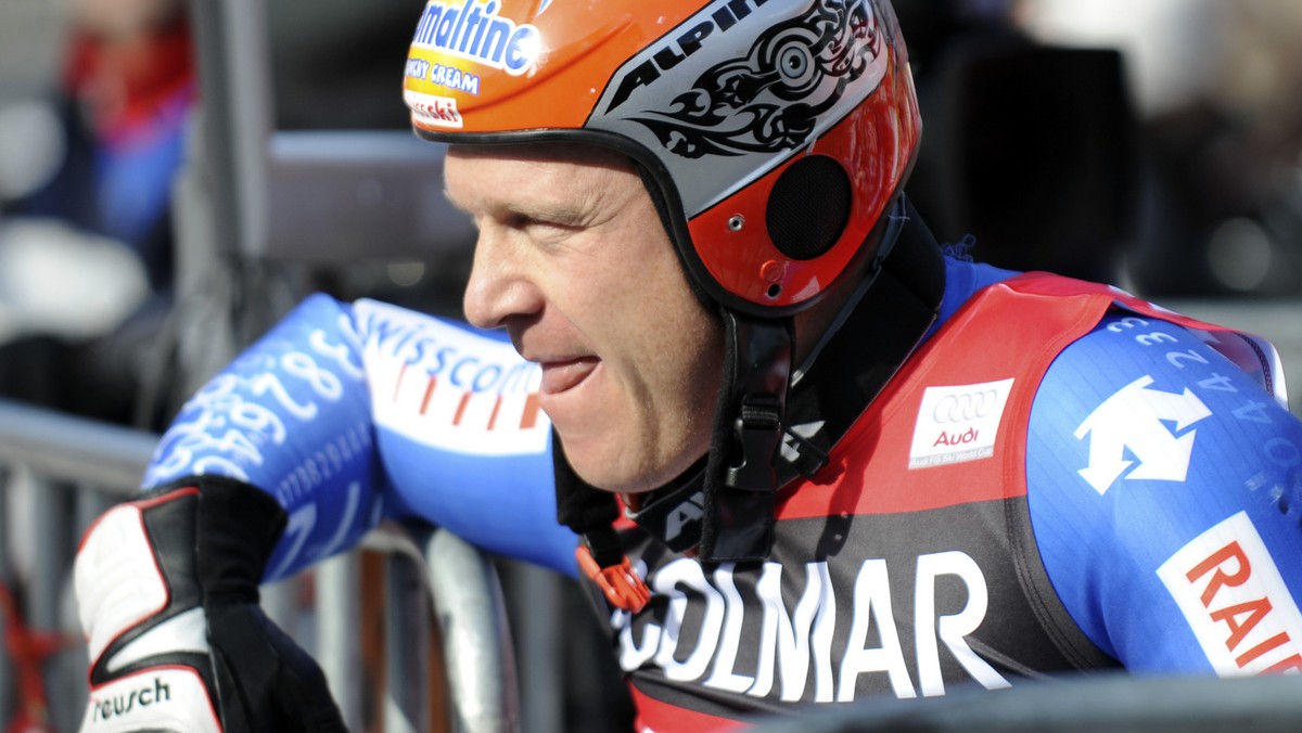 Didier Cuche, of Switzerland, reacts after completing a men's super-G, at the alpine ski, World Cup finals, in Bormio, Italy, Thursday, March 13, 2008. (AP Photo/Armando Trovati)