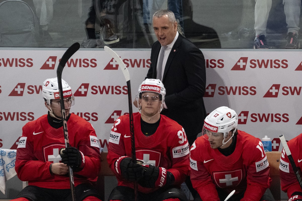 epa12965644 Switzerland's head coach Jan Cadieux looks on during the 2026 IIHF Men's Ice Hockey World Championship preliminary round group A game between Switzerland and Latvia, in Zurich, S ...